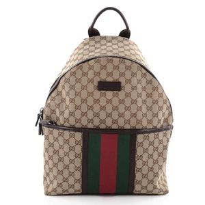 This Gucci Monogram Supreme Canvas Backpack Purse